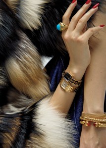 Dennis Basso fox fur coat; Hermès cotton denim shirt; Tommy Hilfiger cotton and lyocell jeans; David Yurman Renaissance Cablespira Bracelet in 18-karat yellow gold with Carnelian and Madeira Citrine and David Yurman Buckle Cablespira Bracelet in 18-karat yellow gold with rubies and diamonds; Van Cleef & Arpels “Perlée diamonds” bracelet featuring diamonds set in 18-karat yellow gold; Mish Fine Jewelry Ratu Ring in turquoise, aquamarine, Paraiba tourmaline, blue sapphire and pink diamond set in 18-karat yellow gold; Cartier Panthère de Cartier watch, 18-karat yellow gold; Chanel Première Édition Originale Watch, steel coated with yellow gold and black leather, black-lacquered dial.
