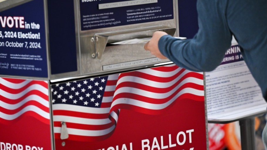 Voters return ballots at the Department of Elections at San Francisco City Hall on Tuesday.