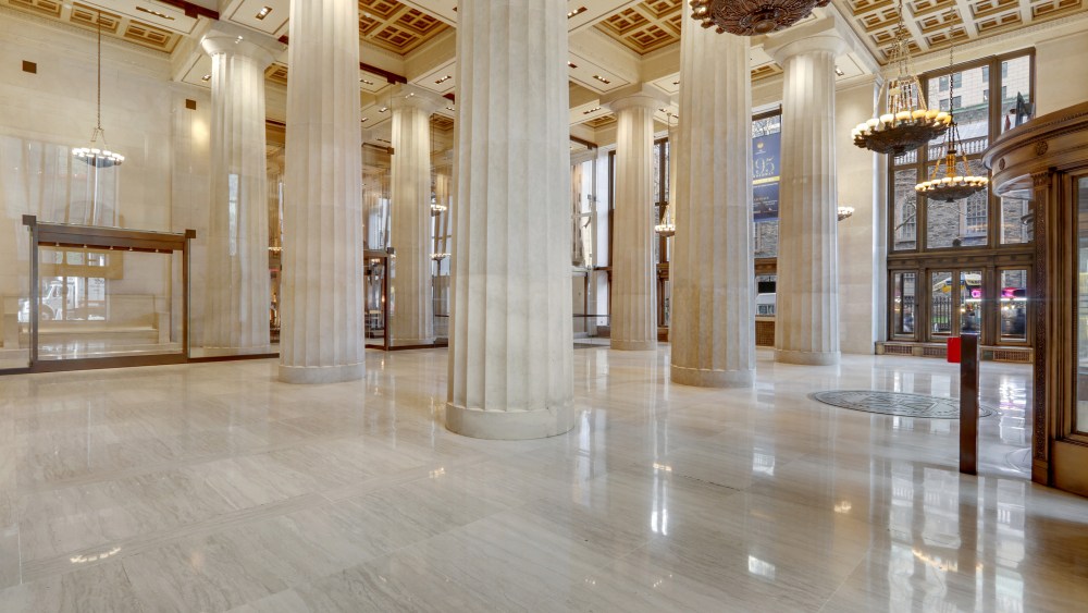 The renovated lobby at 195 Broadway where Brooks Brothers will open next year.