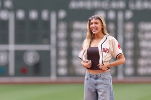 Podcaster Alex Cooper throws out the first pitch before a game between the Toronto Blue Jays and the Boston Red Sox at Fenway Park on June 26, 2024 in Boston, Massachusetts.