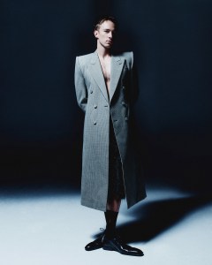 McQueen dogtooth wool mohair double-breasted tailored coat; David Koma wide leg tailored tinsel shorts. Loewe shiny calfskin crown oxfords.