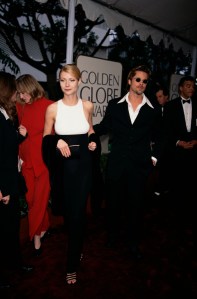 Gwyneth Paltrow in Calvin Klein and Brad Pitt at Golden Globe Awards in 1996.