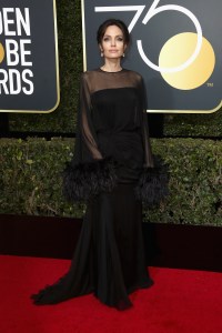 Angelina Jolie in Versace attends The 75th Annual Golden Globe Awards at The Beverly Hilton Hotel on January 7, 2018.