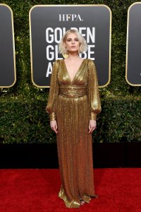 Lucy Boynton in Celine arrive to the 76th Annual Golden Globe Awards held at the Beverly Hilton Hotel on January 6, 2019.