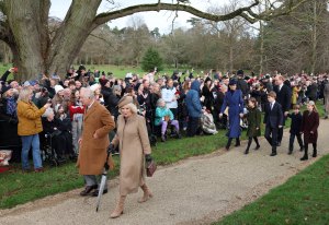 Britain's King Charles III, Britain's Queen Camilla, Britain's Catherine, Princess of Wales, Britain's Princess Charlotte of Wales, Britain's Prince George of Wales, Britain's Prince William, Prince of Wales, Britain's Prince Louis of Wales and Mia Tindall arrive for the Royal Family's traditional Christmas Day service at St Mary Magdalene Church on the Sandringham Estate in eastern England, on December 25, 2023.