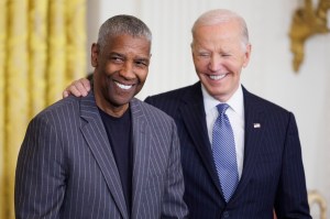 WASHINGTON, DC - JANUARY 4: Actor Denzel Washington greets U.S. President Joe Biden before being awarded the Presidential Medal of Freedom in the East Room of the White House on January 4, 2025 in Washington, DC. President Biden is awarding 19 recipients with the nation's highest civilian honor. President Biden is awarding 19 recipients with the nation's highest civilian honor. (Photo by Tom Brenner/Getty Images)