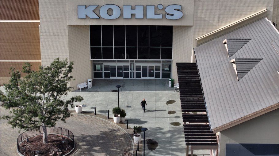 The beleaguered department store is laying off 690 employees at the San Bernardino warehouse, and trimming its brick-and-mortar footprint.