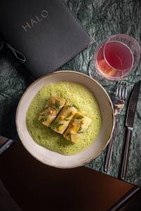 Halo’s chef Victor Blanchet is offering inventive dishes like this daikon radish ballotine stuffed with seasonal vegetables and with a chervil and parsley emulsion.