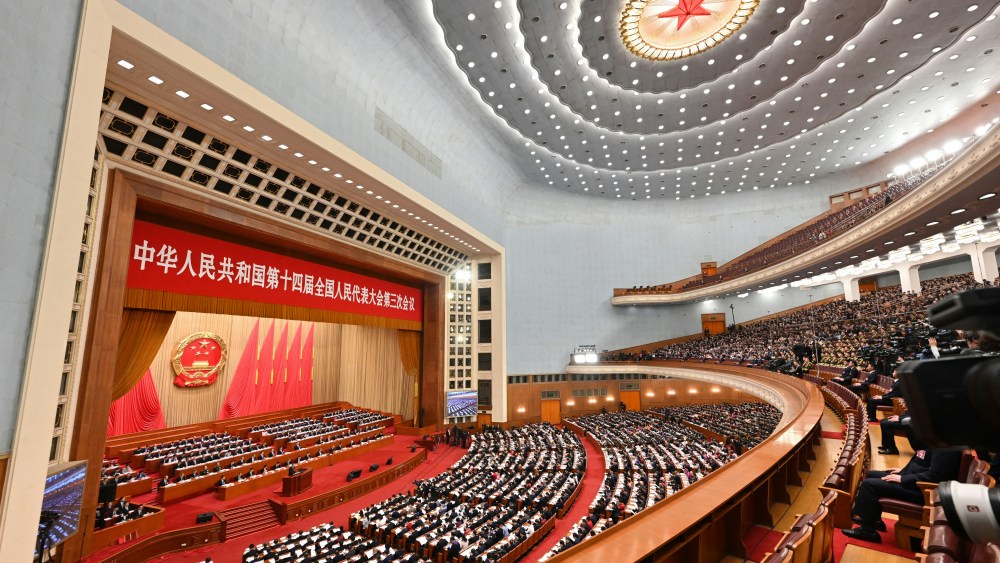 Delegates attend the "Two Sessions" at the Great Hall of the People in Beijing on March 5, 2025.