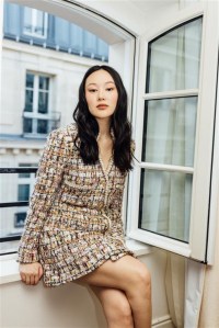 Yerin Ha gets ready for the Chanel fall 2025 show.