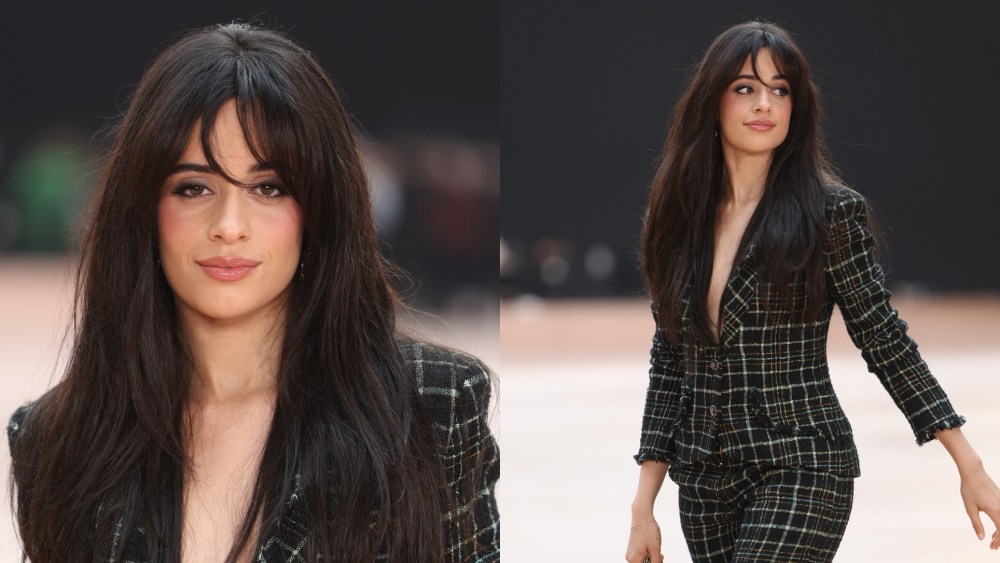 Camila Cabello poses for photos ahead of Chanel's fall 2025 ready-to-wear collection show during Paris Fashion Week.