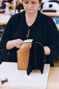 Getting ready to flip a handbag inside out at Chanel’s AVH factory.