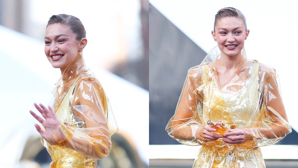 Gigi Hadid smiles for photos at the Rabanne pop-up in New York City.
