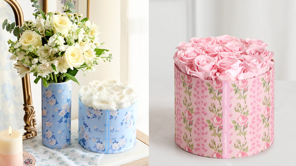 flowers in a vase and hatbox standing next to a candle and mirror; pink roses in a hatbox adorned with a pink print