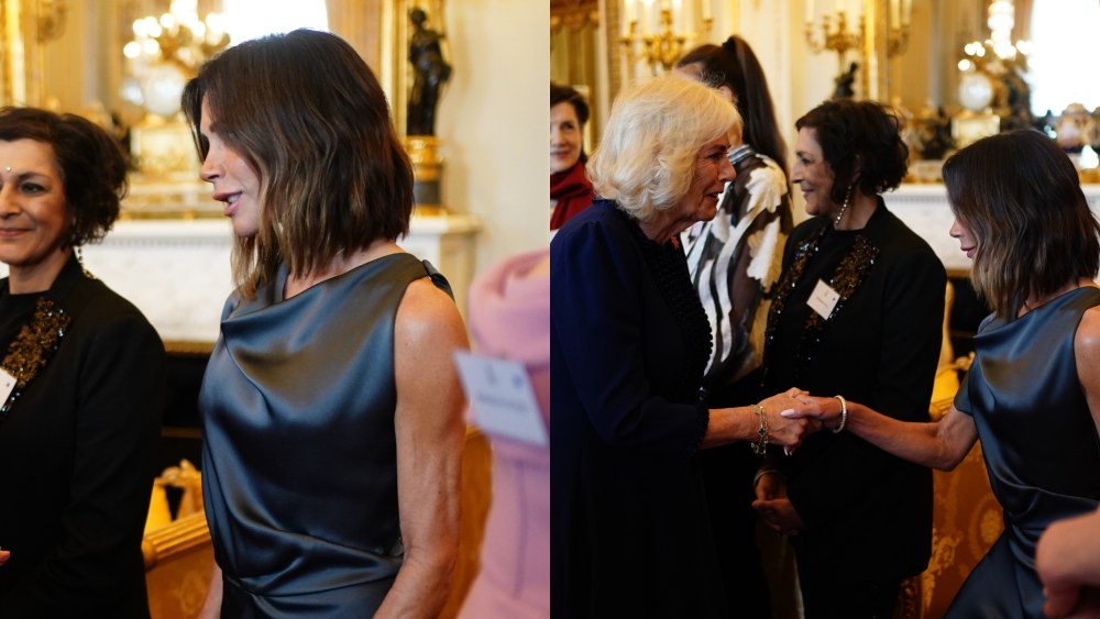 Queen Camilla greets Victoria Beckham at Buckingham Palace.