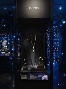 Showcasing treasures inspired by worlds beyond our own, the “Beyond Earth” display includes the Trappist transformable necklace and earrings (2021).