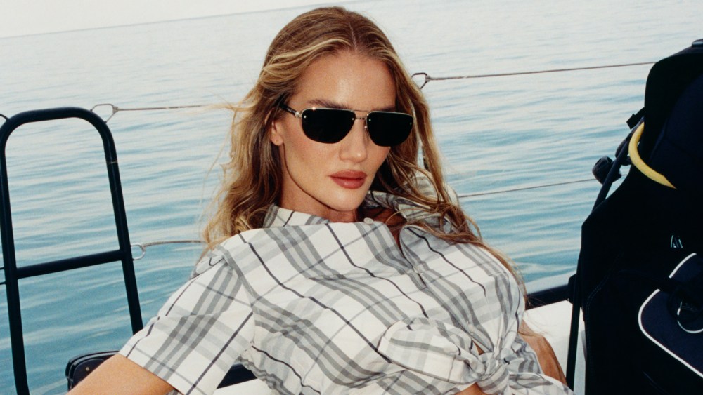 Rosie Huntington-Whiteley wearing a check bikini in Burberry's high summer 2025 campaign.