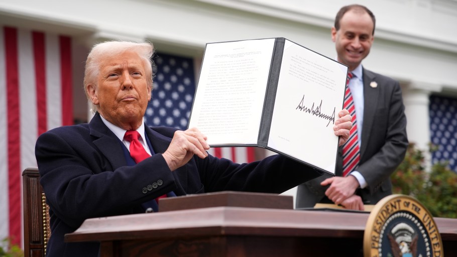 President Donald Trump signed two trade-related executive orders at the White House Rose Garden on Wednesday.