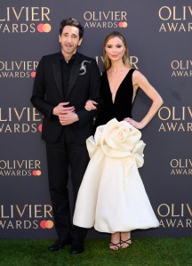 LONDON, ENGLAND - APRIL 06: Adrien Brody and Georgina Chapman attend The Olivier Awards 2025 at The Royal Albert Hall on April 06, 2025 in London, England. (Photo by Karwai Tang/WireImage)