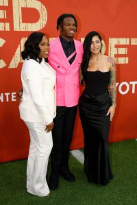 GREEN BAY, WISCONSIN - APRIL 24: Wide Receiver/Cornerback Travis Hunter of Colorado arrives with Ferrante Harris and Leanna Lenee prior to the 2025 NFL Draft at Lambeau Field on April 24, 2025 in Green Bay, Wisconsin.  (Photo by Michael Reaves/Getty Images)