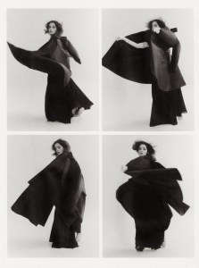 Dior Men blended silk scuba canvas coat over Proenza Schouler pleated jersey dress. Carolina Amato gloves.