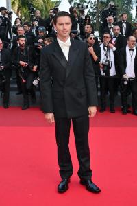 Patrick Schwarzenegger at "The Phoenician Scheme" Premiere during the 78th Cannes Film Festival at Palais des Festivals on May 18, 2025 in Cannes, France.