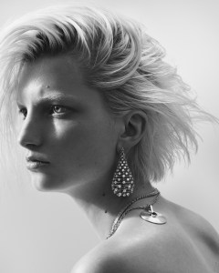 Nikos Koulis 18-karat yellow gold earrings with round white diamonds; Anita Ko 18-karat yellow gold baguette diamond arrow choker; Jade Ruzzo medium Cymbal pendant with seafoam tourmaline on 18-karat yellow gold chain.