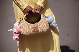 CANNES, FRANCE - MAY 17: Zufi Alexander wears an all Miu Miu look made of butter yellow long summer dress and straw Miu Miu bag with attached Labubu bag charms during day five of the 78th Cannes Film Festival on May 17, 2025 in Cannes, France. (Photo by Raimonda Kulikauskiene/Getty Images)