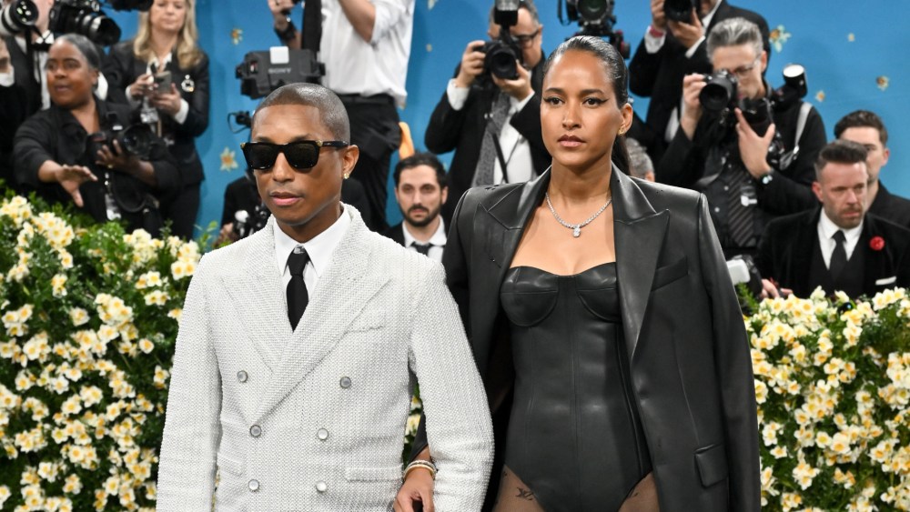 Pharrell Williams, Helen Lasichanh at The 2025 Met Gala Celebrating "Superfine: Tailoring Black Style" held at the Metropolitan Museum of Art on May 5, 2025 in New York, New York.