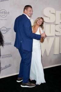 Rob Gronkowski, Camille Kostek at the Sports Illustrated Swimsuit Issue launch party held at the Hard Rock Times Square on May 15, 2025 in New York, New York.