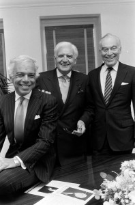 Designer Ralph Lauren and executives Leonard Lauder and Marvin Traub pose for pictures during a meeting to choose an appropriate photo for Marvin Traub's retirement party invitations. (Photo by Thomas Iannaccone/WWD/Penske Media via Getty Images)