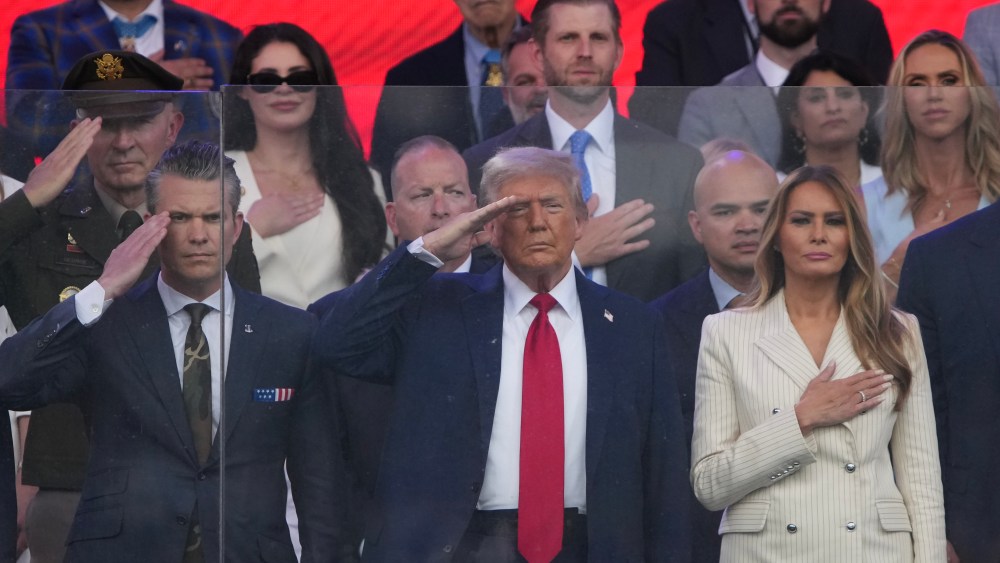 WASHINGTON, DC - JUNE 14:U.S. President Donald Trump, First Lady Melania Trump, and Defense Secretary Pete Hegseth along with other guests watch as members of the U.S Army parade down Constitution Avenue marking the 250th birthday of the U.S. Army June 14, 2025 in Washington, DC. The U.S. Army is marking its 250th birthday with a military parade including roughly 6,600 troops, 150 vehicles, and over 50 aircraft.  The parade, which coincides with President Donald Trump's 79th birthday, is designed to tell the history of the Army. (Photo by Andrew Harnik/Getty Images)