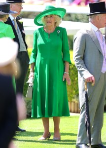 ASCOT, ENGLAND - JUNE 18: Queen Camilla smiles as she attends day two of Royal Ascot at Ascot Racecourse on June 18, 2025 in Ascot, England.  (Photo by Chris Jackson/Getty Images)