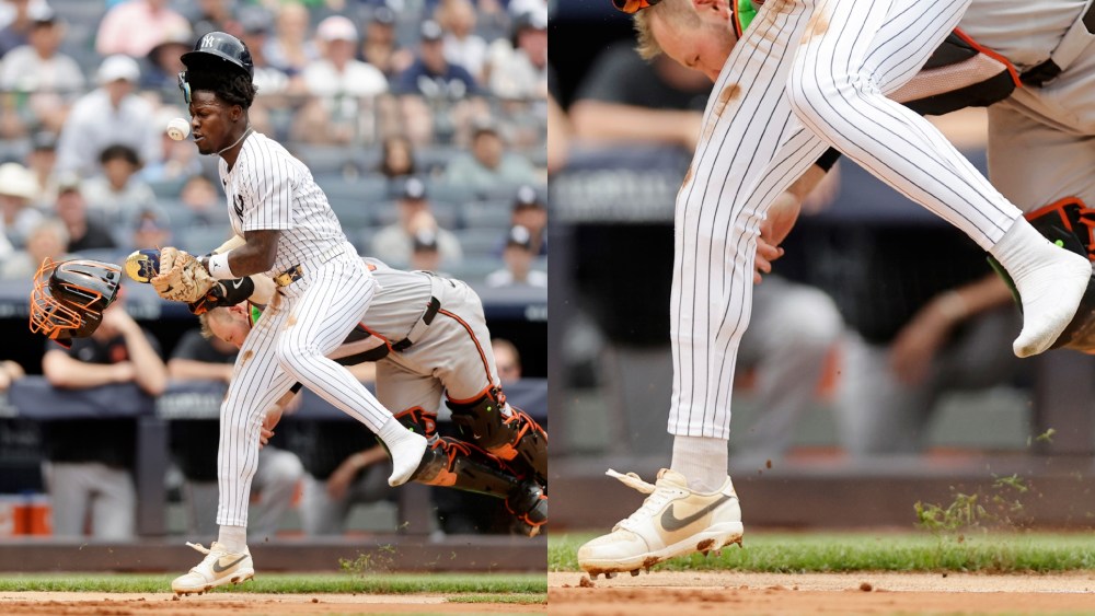 Jazz Chisholm Jr. #13 of the New York Yankees scores a run during the second inning after colliding with catcher Maverick Handley #98 of the Baltimore Orioles at Yankee Stadium on June 22, 2025 in New York City.