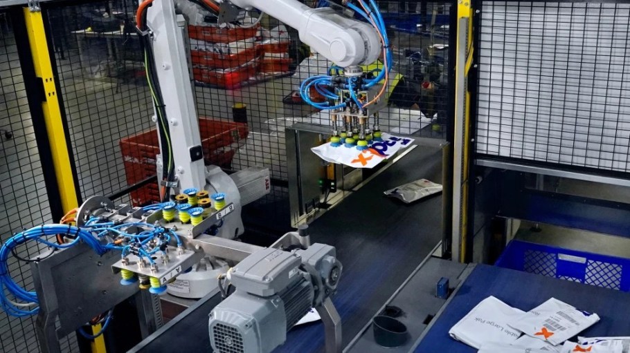 Robotic arm in a FedEx facility.