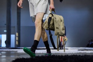 MILAN, ITALY - JUNE 22: A model, shoe and bag detail, walks the runway at the Prada fashion show during the Milan Menswear Spring/Summer 2026 Fashion Week on June 22, 2025 in Milan, Italy. (Photo by Pietro D'Aprano/Getty Images)