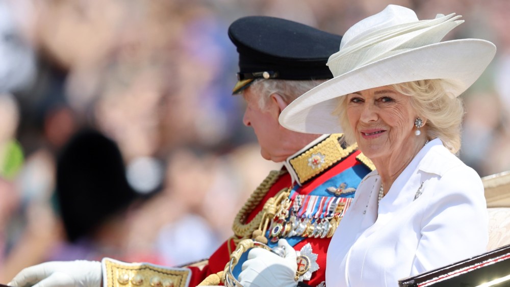 LONDON, ENGLAND - JUNE 14: King Charles III and Queen Camilla arrive on an Ascot Landau carriage during Trooping The Colour 2025 on June 14, 2025 in London, England. Trooping The Colour is a ceremonial parade celebrating the official birthday of the British Monarch. The event features over 1,400 soldiers and officers, accompanied by 200 horses. More than 400 musicians from ten different bands and Corps of Drums march while performing. (Photo by Chris Jackson/Getty Images)