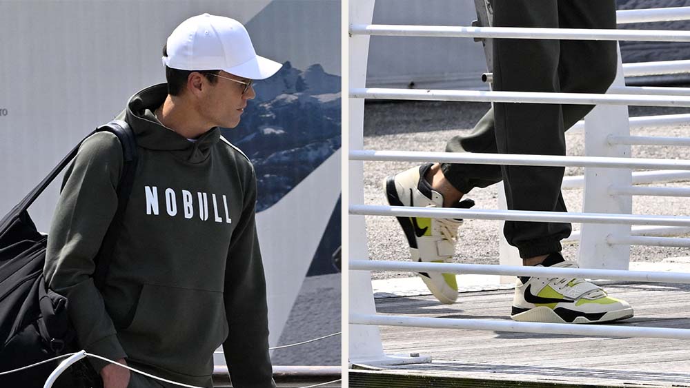 Tom Brady arrives in Venice for Jeff Bezos and Lauren Sánchez's wedding wearing Travis Scott Jordan Jumpman Jack TR in Bright Cactus
