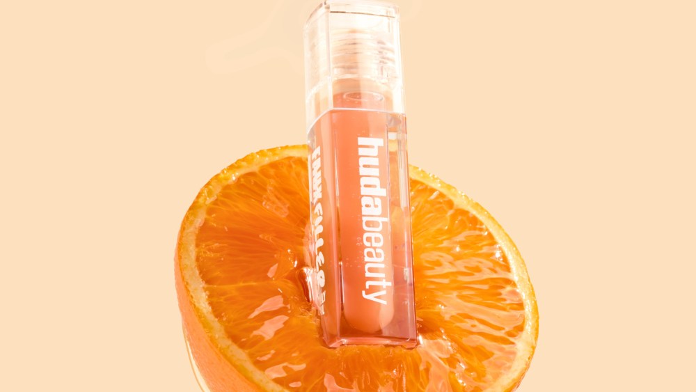 Huda Beauty's Kalamantina Faux Filler Lip Oil, a limited-edition collaboration with musician Saint Levant.