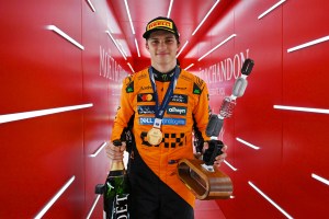 SPA, BELGIUM - JULY 27: Race winner Oscar Piastri of Australia and McLaren leaves the podium with his trophy and Champagne during the F1 Grand Prix of Belgium at Circuit de Spa-Francorchamps on July 27, 2025 in Spa, Belgium. (Photo by Mark Sutton - Formula 1/Formula 1 via Getty Images)