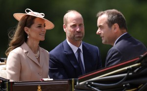 WINDSOR, ENGLAND - JULY 8: Catherine, Princess of Wales and Prince William, Prince of Wales ride with with Sebastien Lecornu, Minister for the Armed Forces in the carriage procession to Windsor Castle ahead of the Ceremonial Welcome for the state visit to the UK of the President of France Emmanuel Macron and his wife Brigitte Macron at Windsor Castle on July 8, 2025 in Windsor, England. President Emmanuel Macron and Mrs Brigitte Macron visit the UK in the first visit State Visit made by France in 17 years. They are staying at Windsor Castle, hosted by King Charles III and Queen Camilla, and a banquet will be held there in their honour. The Macrons will visit Imperial College, and the President will address Parliament during his stay.  (Photo by Andrew Matthews - WPA Pool/Getty Images)