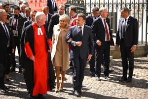 LONDON, ENGLAND - JULY 8: President of France Emmanuel Macron and his wife Brigitte Macron are greeted by Reverend David Stanton as they arrive at Westminster Abbey on July 8, 2025 in London, England. President Emmanuel Macron and Mrs Brigitte Macron visit the UK in the first visit State Visit made by France in 17 years. They are staying at Windsor Castle, hosted by King Charles III and Queen Camilla, and a banquet will be held there in their honour. The Macrons will visit Imperial College, and the President will address Parliament during his stay. (Photo by Leon Neal/Getty Images)