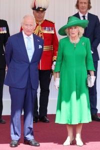 WINDSOR, ENGLAND - JULY 08: King Charles III and Queen Camilla await the arrival of President Emmanuel Macron and Mrs Brigitte Macron on July 08, 2025 in Windsor, England. President Emmanuel Macron and Mrs Brigitte Macron visit the UK in the first visit State Visit made by France in 17 years. They are staying at Windsor Castle, hosted by King Charles III and Queen Camilla, and a banquet will be held there in their honour. The Macrons will visit Imperial College, and the President will address Parliament during his stay. (Photo by Chris Jackson/Getty Images)