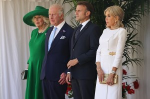 WINDSOR, ENGLAND - JULY 8:  King Charles III and Queen Camilla welcome French President Emmanuel Macron and his wife Brigitte Macron to Windsor Castle during a Ceremonial Welcome for the state visit to the UK of the President of France Emmanuel Macron and his wife Brigitte Macron at Windsor Castle on July 8, 2025 in Windsor, England. President Emmanuel Macron and Mrs Brigitte Macron visit the UK in the first visit State Visit made by France in 17 years. They are staying at Windsor Castle, hosted by King Charles III and Queen Camilla, and a banquet will be held there in their honour. The Macrons will visit Imperial College, and the President will address Parliament during his stay.  (Photo by Richard Pohle - WPA Pool/Getty Images)