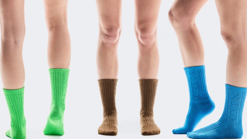 three on-model photos of the on x loewe socks in green, brown, and blue