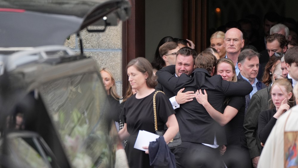 Mourners embrace following the funeral of Martha Nolan-O'Slatarra at the Cathedral of the Assumption, Carlow. Ms Nolan-O'Slatarra, 33, was discovered unconscious on the boat at Montauk Yacht Club, New York, in the early hours of August 5. Picture date: Wednesday August 20, 2025. (Photo by Niall Carson/PA Images via Getty Images)
