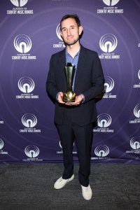NASHVILLE, TENNESSEE - AUGUST 20: Brandon Davis of "Twisters" poses with the ACM Film Award during the 18th Academy Of Country Music Honors at The Pinnacle on August 20, 2025 in Nashville, Tennessee. (Photo by Terry Wyatt/Getty Images for ACM)