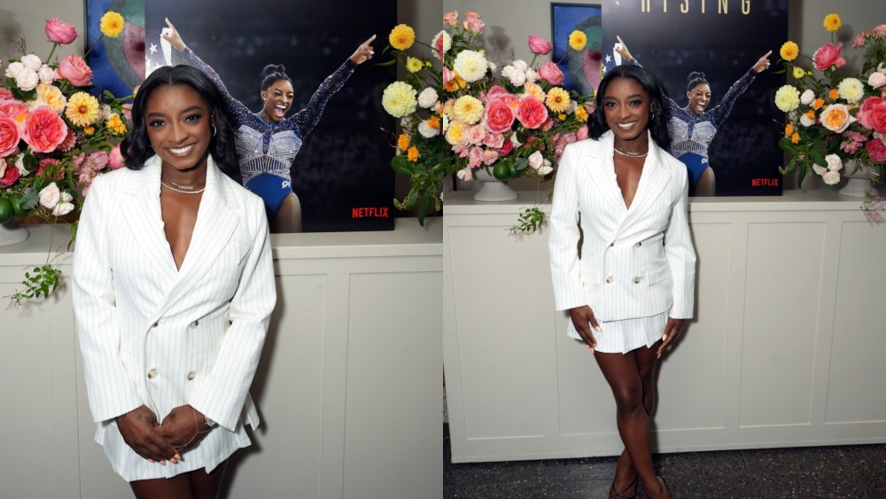 Simone Biles wears a pinstrip skirt suit to an event for 'Simone Biles Rising' in West Hollywood, Calif.