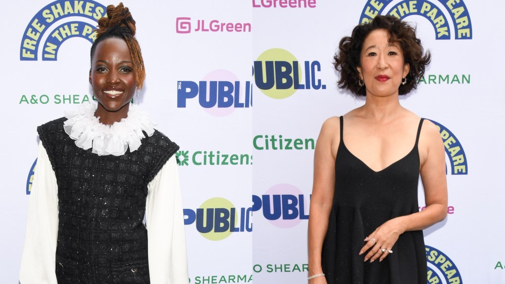 Lupita Nyong'o wears Chanel and Sandra Oh wears CFCL at Shakespeare in the Park's Twelfth Night on Aug. 21, 2025 in New York City.