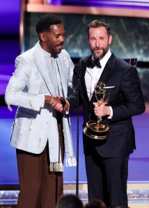 Colman Domingo and Noah Wyle speak onstage at the 77th Primetime Emmy Awards.